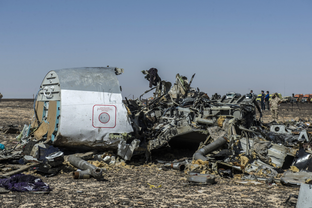 Debris of the A321 Russian airliner lie on the ground a day after the plane crashed in Wadi al-Zolomat, a mountainous area in Egypt's Sinai Peninsula, on November 1, 2015. International investigators began probing why the Russian airliner carrying 224 people crashed in the Sinai Peninsula, killing everyone on board, as rescue workers widened their search for missing victims. AFP PHOTO / KHALED DESOUKI        (Photo credit should read KHALED DESOUKI/AFP/Getty Images)